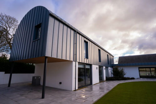 Landscape view of house at Banbridge showing car port